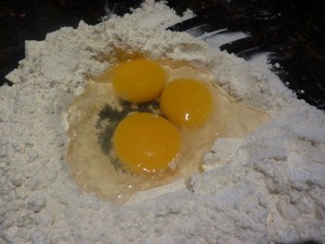 Eggs in well of flour