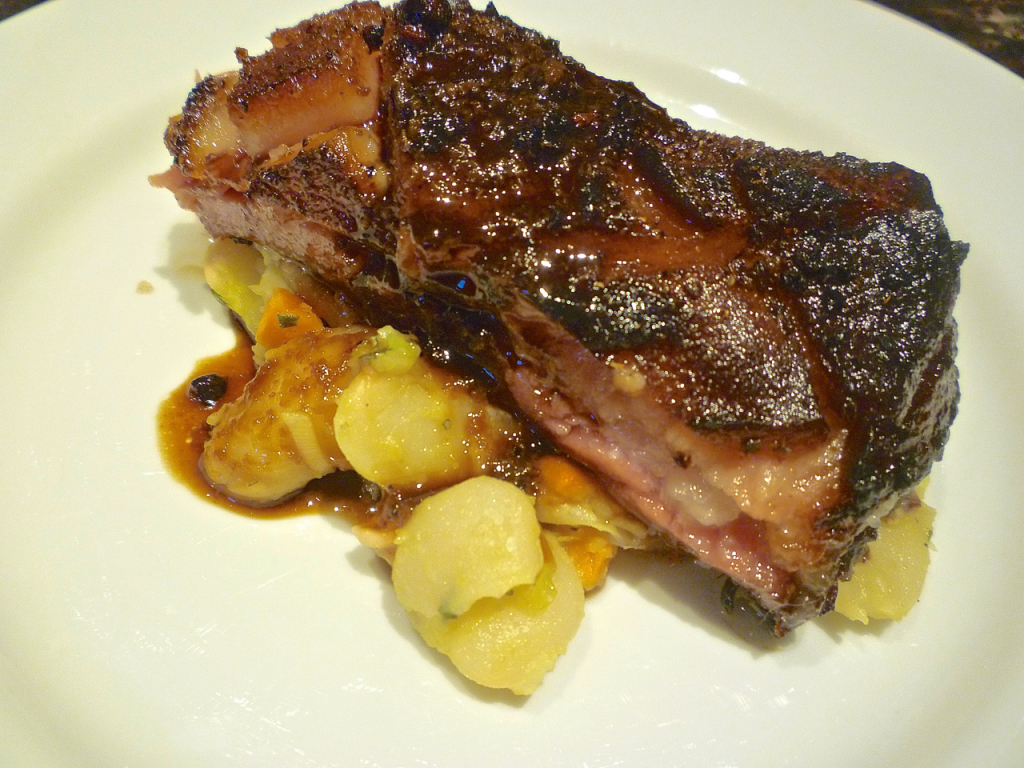 braised pork belly plated private bike tours italy