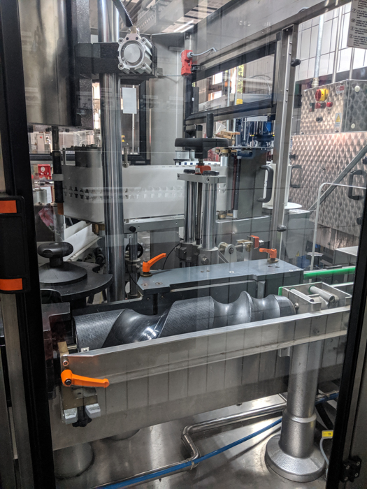 paper-bottling-machine-lageder-private-italy-tours-italiaoutdoors