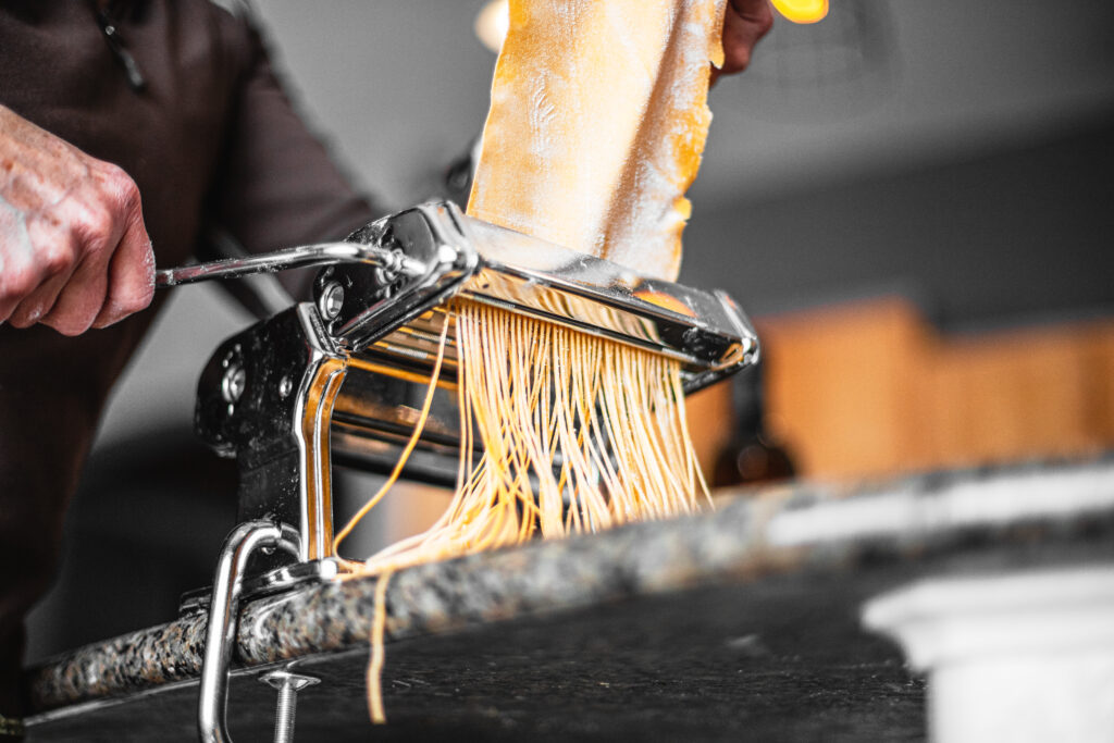 tajarin_cutting_pasta_below_private_italy_tour_piedmont